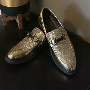 Salvatore Ferragamo gold loafers